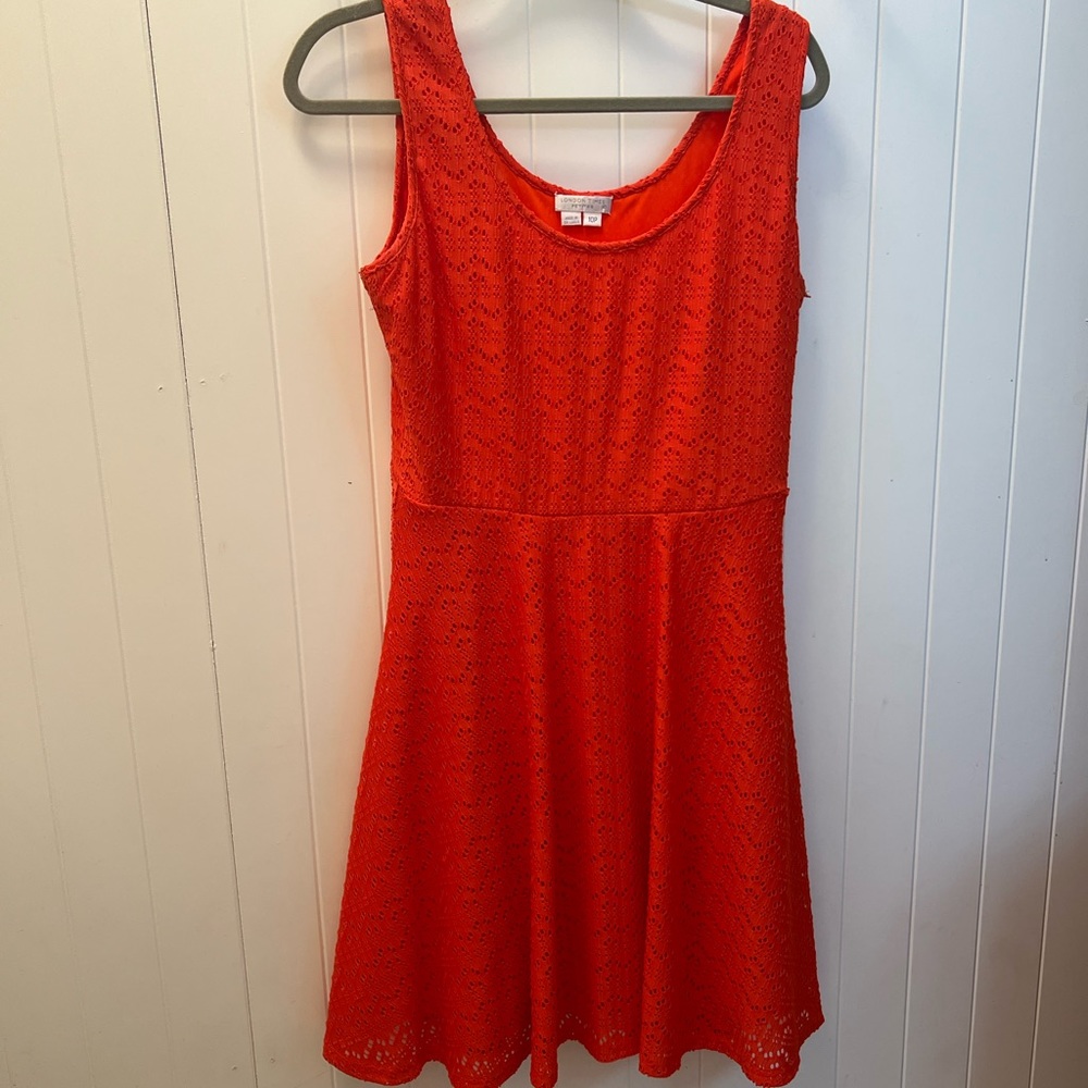 Orange tank dress with circle skirt.